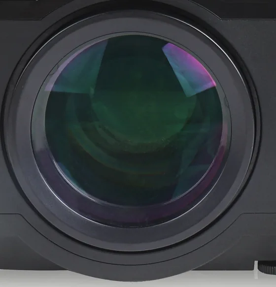 Close-up of the Virelli V309 manual-focus projector lens